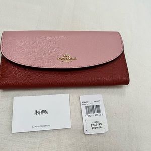 Coach envelope wallet in color block